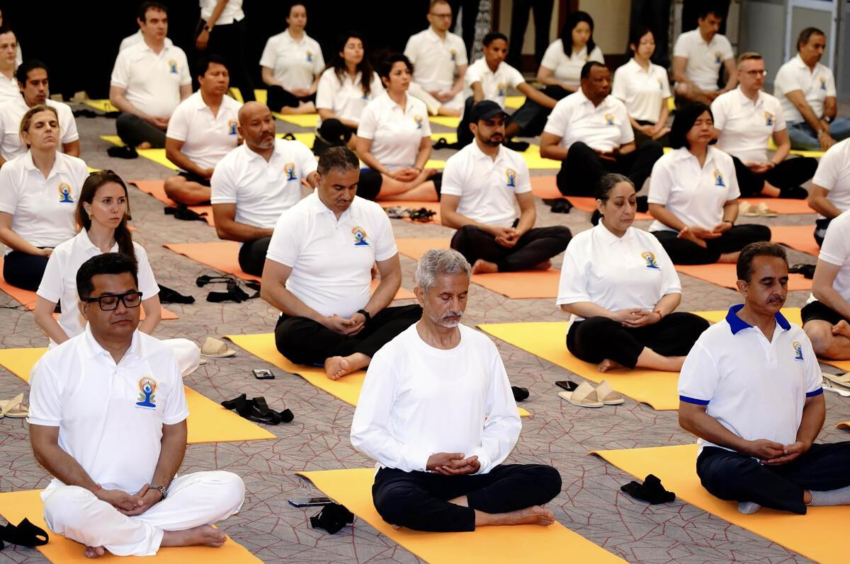 Union External Affairs Minister S Jaishankar performs yoga.